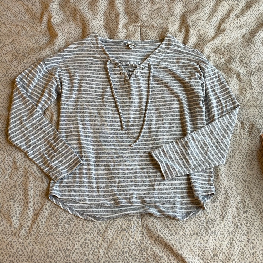 White and grey striped sweater